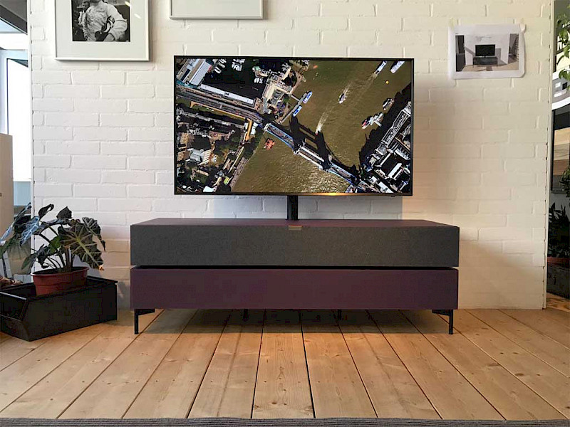 large tv on a spectral stand