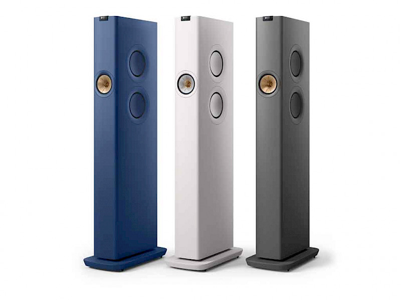 blue, white & grey kef ls60 speakers stood next to each other