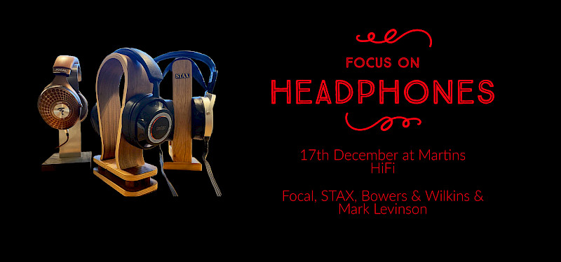 focal, stax and mark levinson headpohones on black background