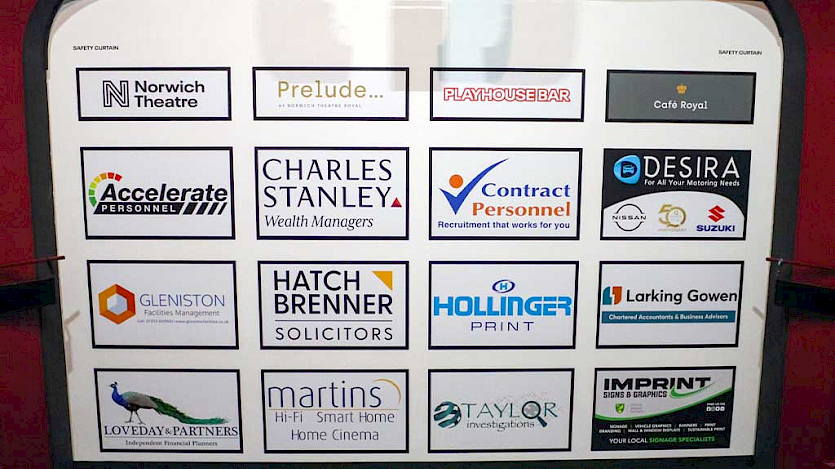 stage curtain with sponsors logos including Martins Hi-Fi
